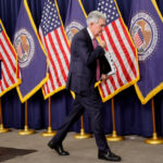 Fed officials see two rate cuts in 2025, but overall turn hawkish